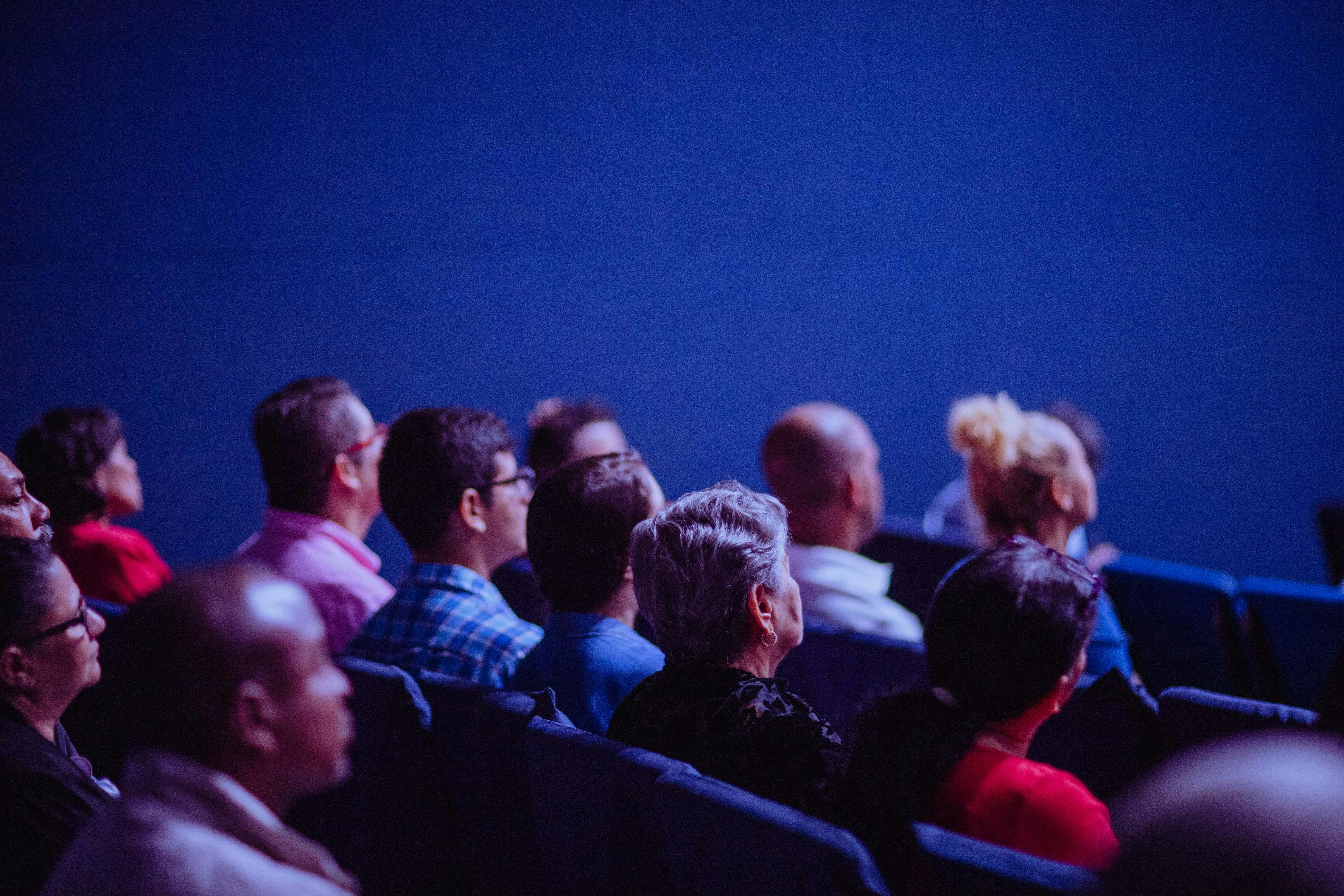 Audience watching a film in the cinema